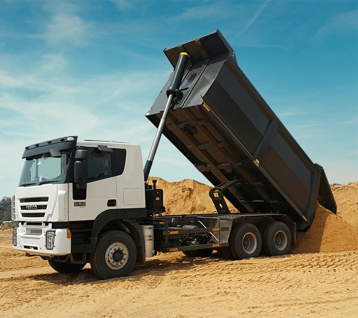 A normal door  is a vehicle designed for transporting loose materials, like gravel or sand. It has a hydraulic system that tilts the truck bed to unload its contents easily.

