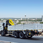 Cargo and crane truck 6x4 equipped with HYVA articulated knuckle-boom crane.​